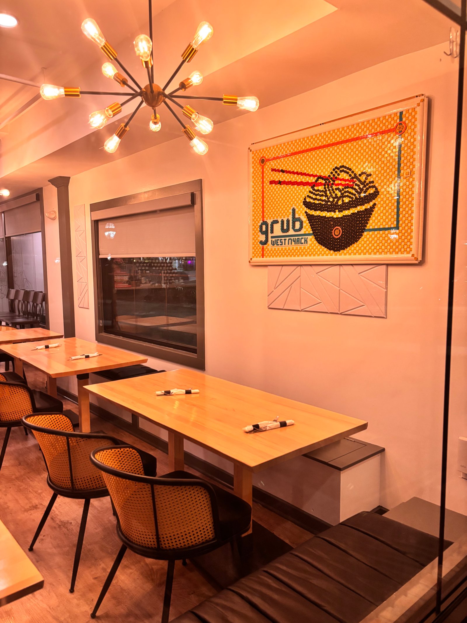 A candlelit table at Rockland Grub set for two